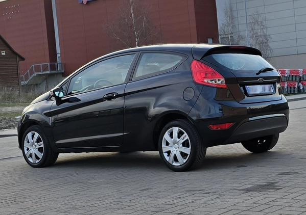Ford Fiesta cena 16900 przebieg: 180000, rok produkcji 2009 z Bełchatów małe 254